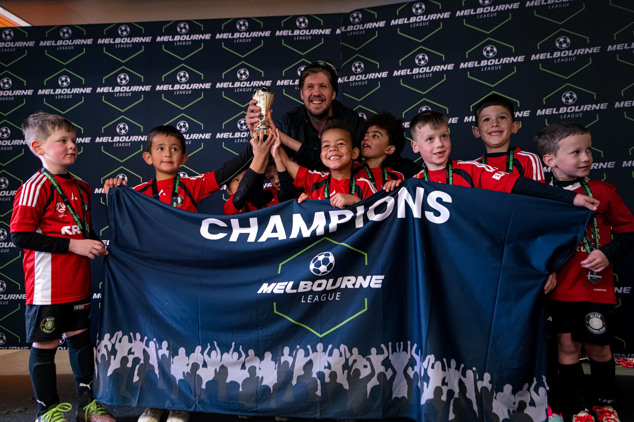 Photo of a study hall area with desks and people studying.